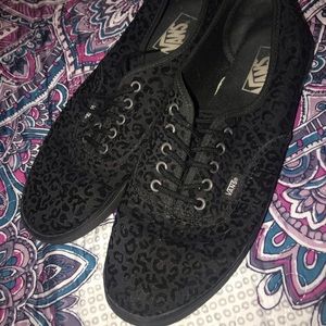 Black Vans sneakers